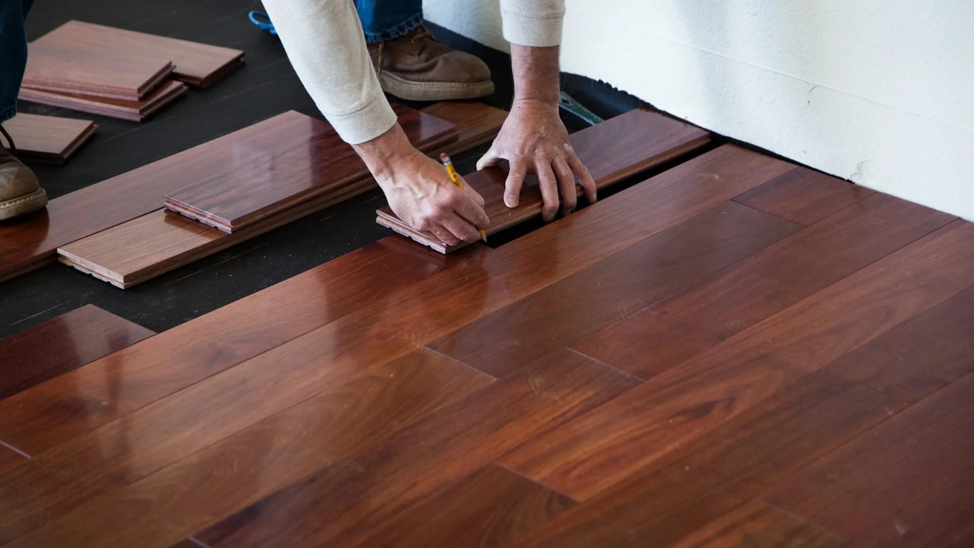 New hardwood is being installed to replace your home's flooring. The rich color is a beautiful, modern upgrade